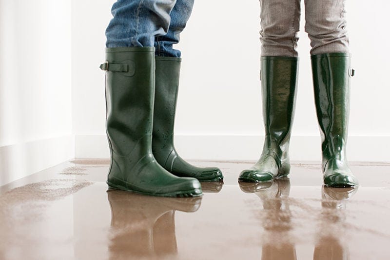 Couple in Puddle of Water