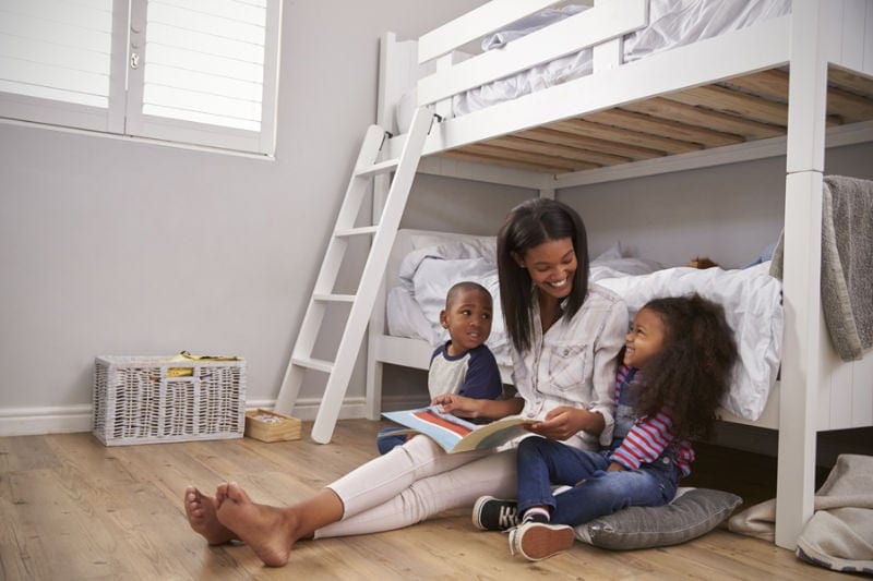 Mother Reading to Kids